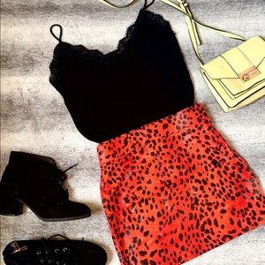 red animal print mini skirt